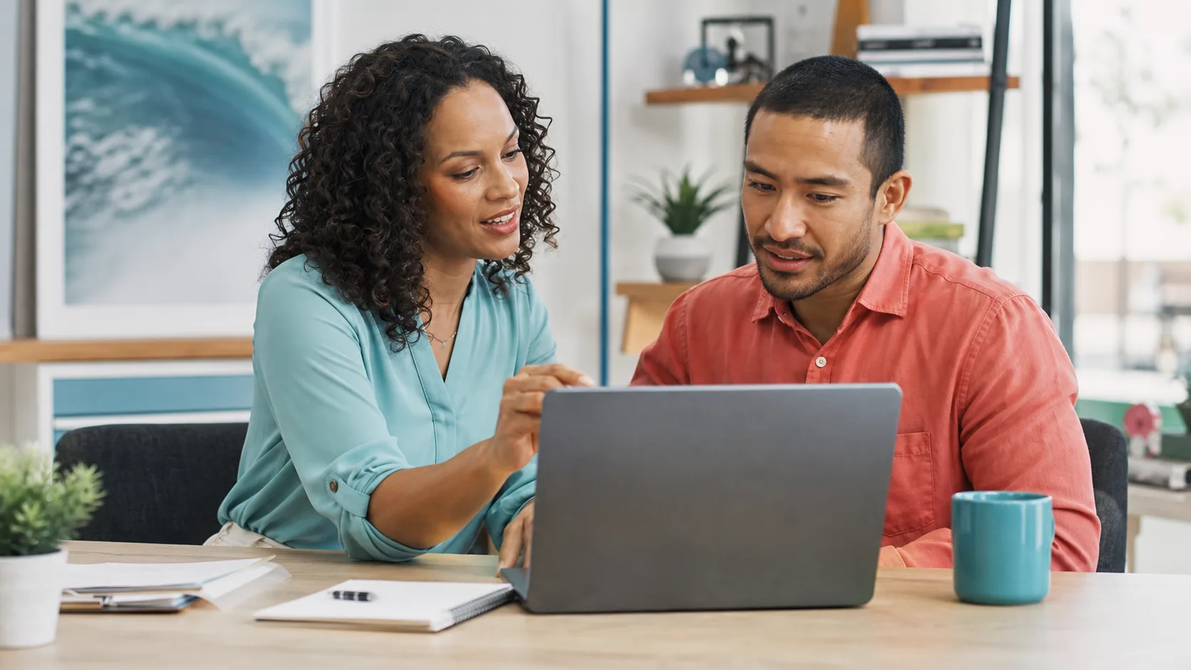 Iris helping a professional-services owner review qualified leads on a laptop